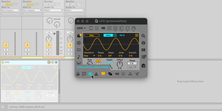 LFO device in Max over top an Ableton Live session, showing the Presentation view. The Freeze button (set to unfreeze to allow editing).