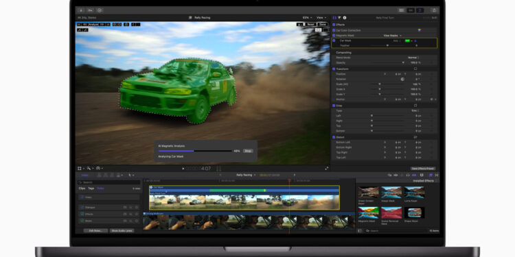 Magnetic Masking demonstration in Final Cut Pro 11 running on a MacBook, showing a car highlighted in green in the edit window plus a status dialog, timeline view open.